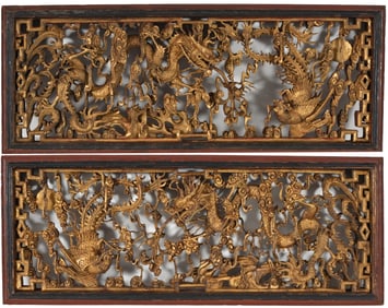Pair of architectural elements. China. 19th century. Deeply carved and pierced with dragons and