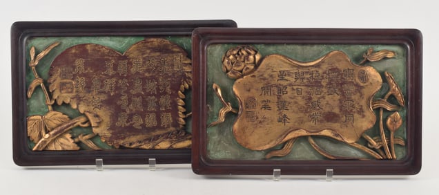 Pair of plaques. China. 19th century. Carved and pierced with leaves and branches. Extensive