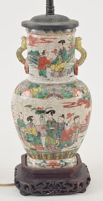 Porcelain vase. China. Early 20th century. Oatmeal ground with famille verte decoration of women and