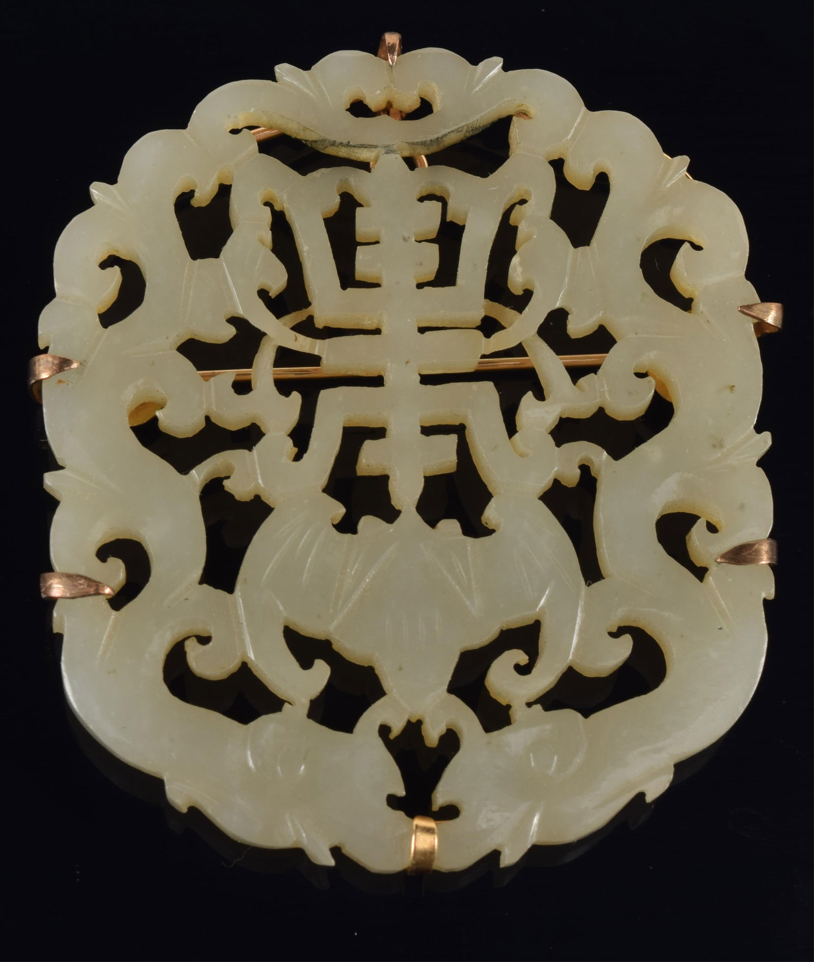 Jade pendant. China. 19th/early 20th century. Carved and pierced with chih lung and shou characters. (1 of 4)