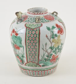 Porcelain vessel with spout. China. Transitional ware with famille verte decoration of flowering
