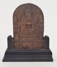 Pottery stelae. North China. 19th century. Lamaist buddhist decoration with an inscription on the