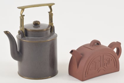 Yi Hsing teapot. China. 19th century. Brass mounted and with a polished surface for the Thai market.