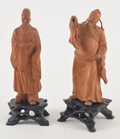 2 carved sandalwood immortals. China. 19th century. Fitted stands. About 7in.