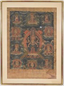 Buddhist icon. North China. Ca. 1900. Thangka with central image of Lokeshavra. Brocade mounts.