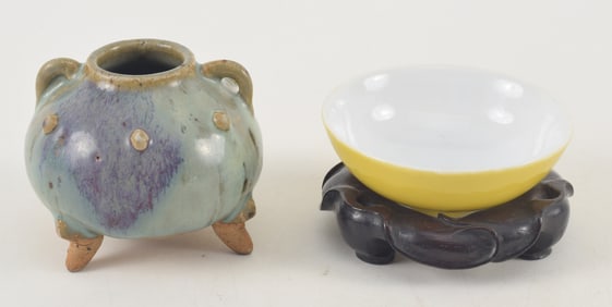 2 porcelains. To include: a small 17th century Chun yao pot and a small yellow Kuang Hsu wine cup.