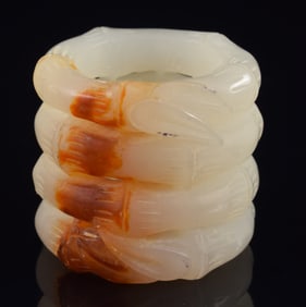 White jade archers ring. China. 20th century.