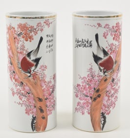 Pair of cap stands. China. Early 20th century. Cylindrical form. Birds and flower decoration. 11in.