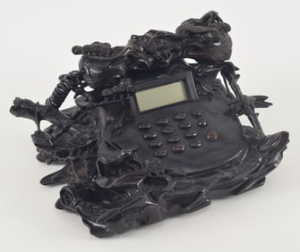 Telephone case. China. 20th century. Finely carved with birds, flowers and gnarled prunus branches.