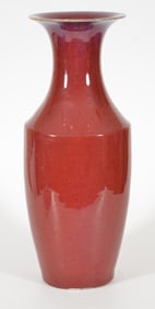 Oxblood vase. China. Early 20th century. Chips. 23in high.