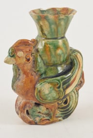 Stoneware vase. China. Probably Tang period. Phoenix form. Chips. 4.5in.