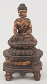 Carved wooden image. China. Early 20th century. Seated figure of Amida. Gilt surface. 18in.