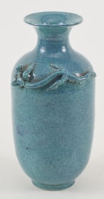 Porcelain vase. China. Robin's egg blue glaze. Molded dragon at the collar. Loss. 7.5in.