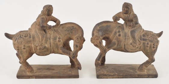 Pair of stone carvings. China. 20th century. Horsewomen in Yuan style. 12 x 13in.