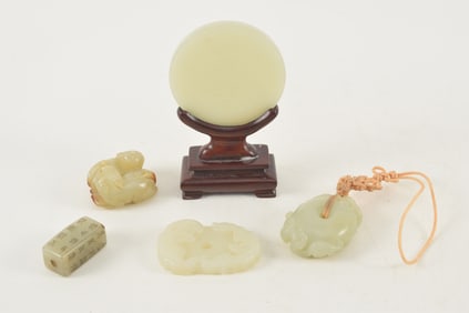5 jade pendants. China. 19th/20th century. Largest 2.25in.