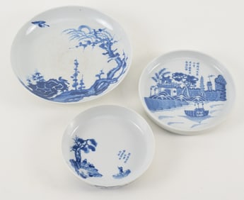 3 porcelain dishes. China. 19th century. Underglaze blue decoration. Largest 9in diameter.