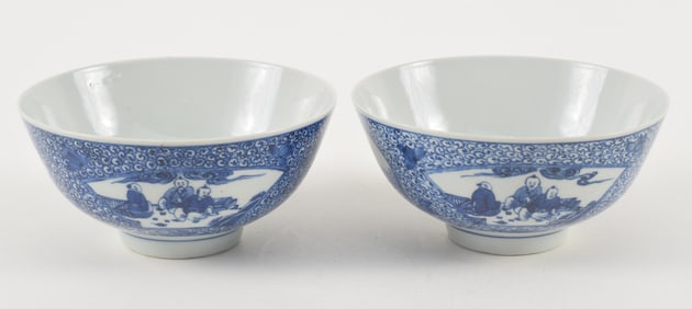 Pair of porcelain bowls. China. 20th century. Underglaze blue decoration of brocade patterns and