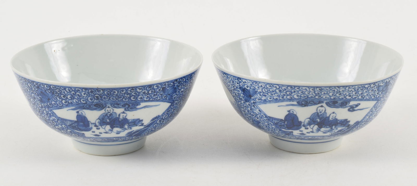 Pair of porcelain bowls. China. 20th century. Underglaze blue decoration of brocade patterns and (1 of 13)