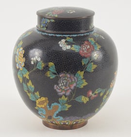 Cloisonne covered jar. China. Early 20th century. Thunder meandre black ground. Decoration of