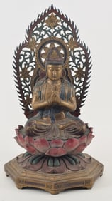 Carved enthroned image of Amida. China. 20th century. Painted and gilded. 23in.