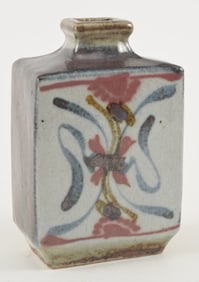 Stoneware vase. Japan. 20th century. Square form with underglaze blue and red decoration. Attributed
