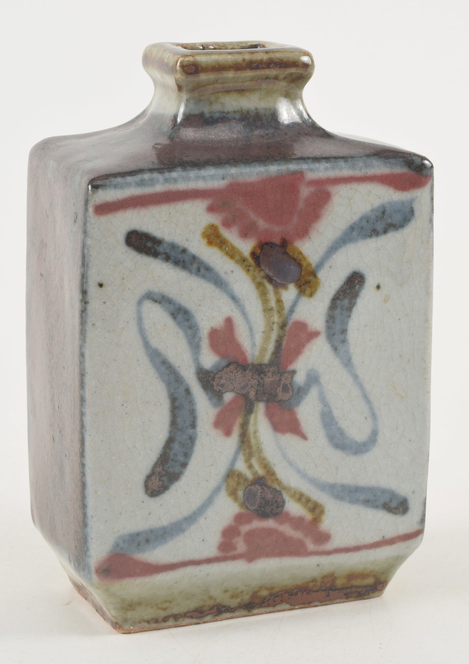 Stoneware vase. Japan. 20th century. Square form with underglaze blue and red decoration. Attributed: Stoneware vase. Japan. 20th century. Square form with underglaze blue and red decoration. Attributed to Kawai Kanjiro. 7 x 4.25in.