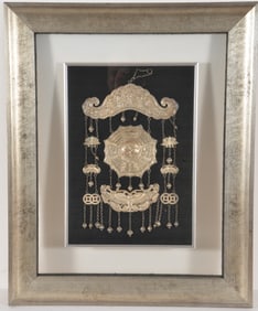 Ethnographic metal work. China. 20th century. Tribal peoples jewelry element in base silver. Framed