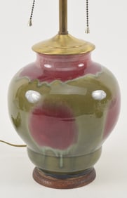 Porcelain vase. China. 20th century. Peach bloom type glaze. Vase: 10in. Drilled and mounted as
