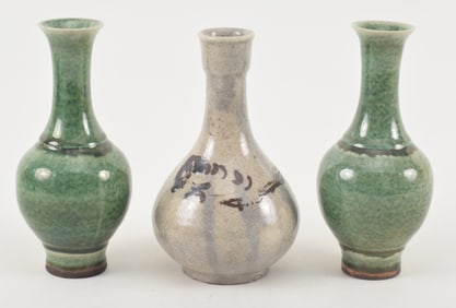 3 vases. China and Japan. To include a Karatsu ware sake bottle and 2 peach bloom vases. Each 7in.