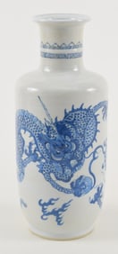 Porcelain vase. China. 20th century. Rouleau form with underglaze blue dragons. 10.25in.