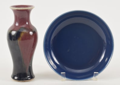 2 porcelains. China. A 20th century flambe vase and a monochrome blue dish marked Chien Lung. 7.5in.