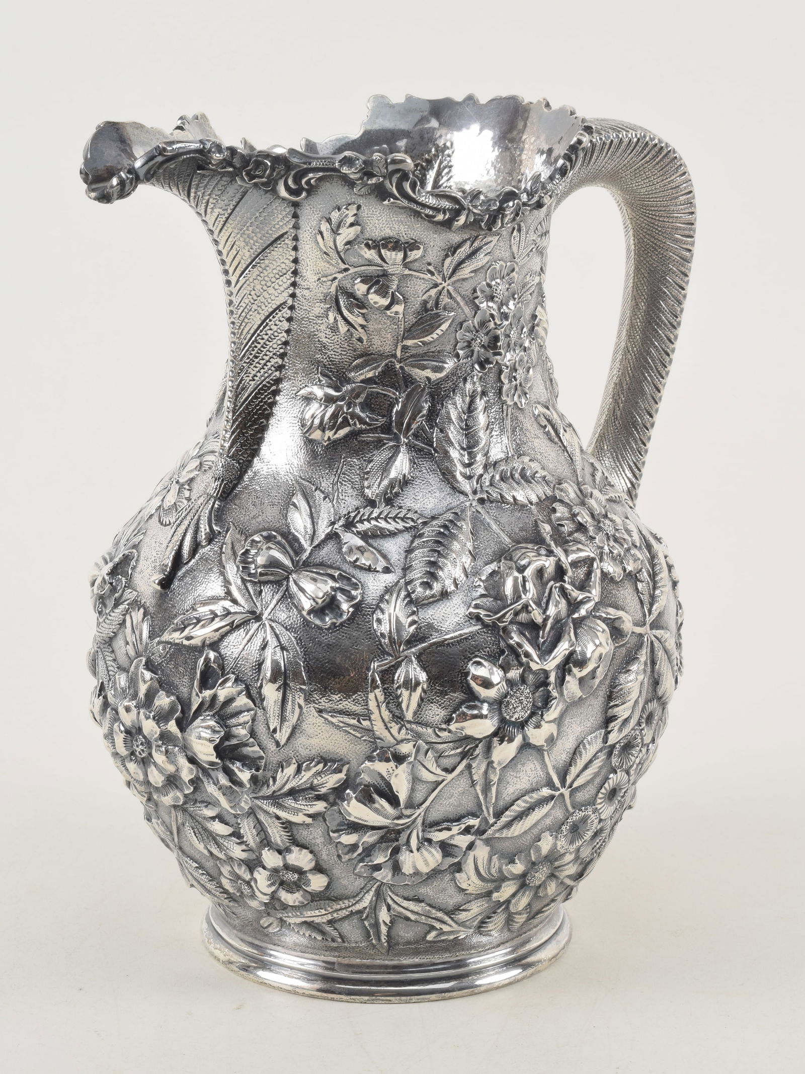 S. Kirk & Son heavy sterling silver repousse water pitcher. Allover floral repousse decoration on a (1 of 14)