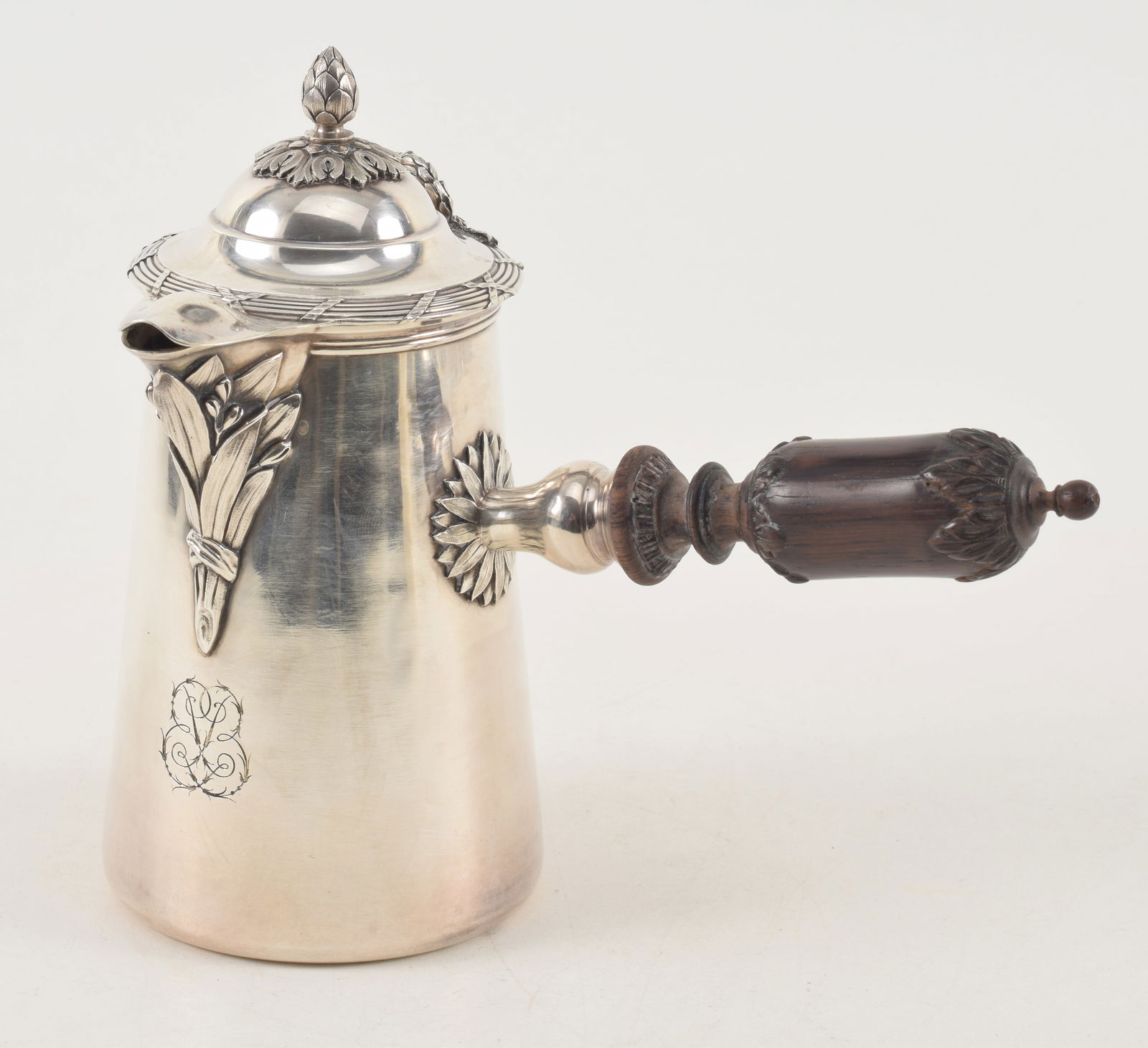 French Bointaburet Paris sterling silver chocolate pot. Relief floral and leaf decoration. Reed: French Bointaburet Paris sterling silver chocolate pot. Relief floral and leaf decoration. Reed border on cover. Relief flower pattern at handle. Monogramed crest. 7.25in high. Hallmarked on base and