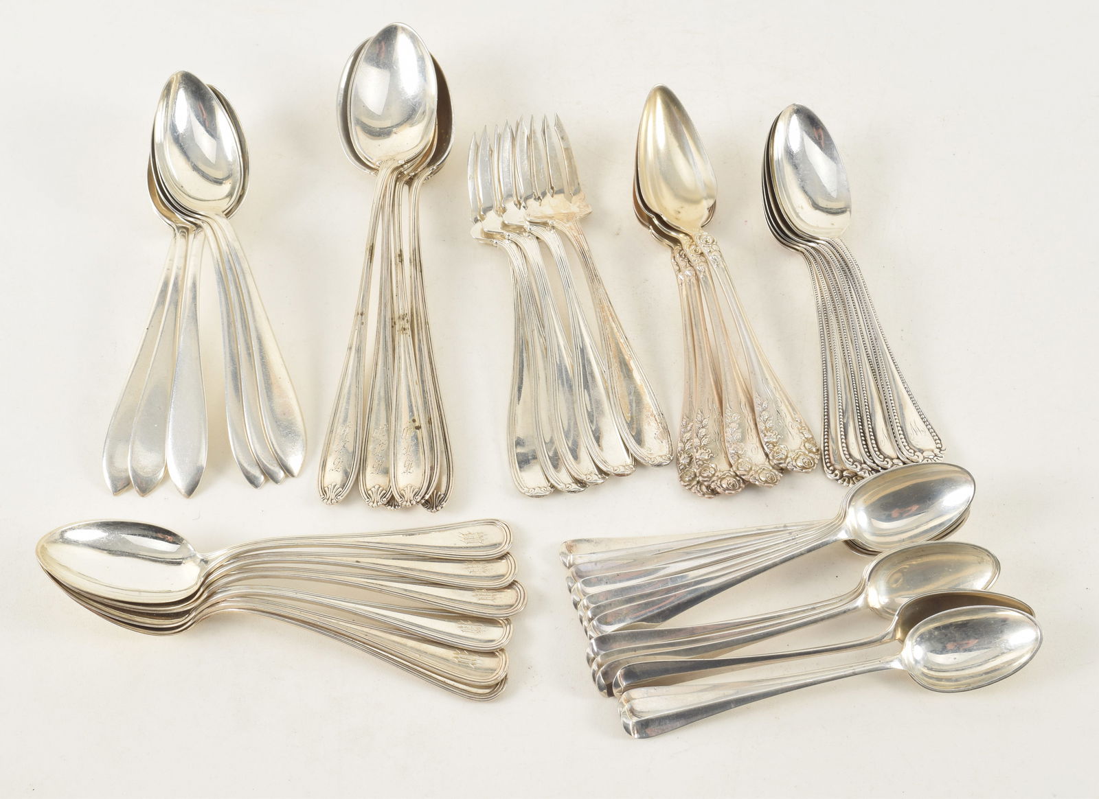 Lot of sterling silver spoon sets. To include: 1) Towle set of 12 teaspoons. 6.2 ozt. 2) Durgin set (1 of 15)
