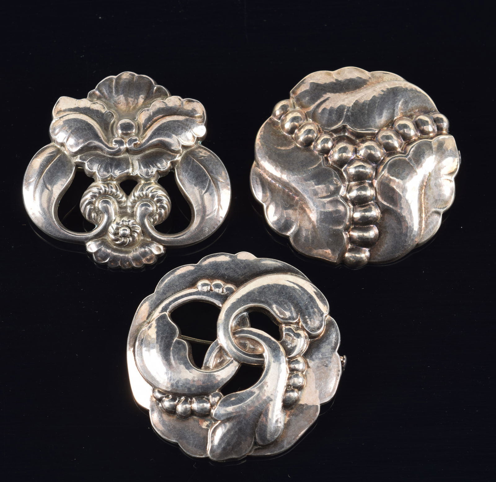 Georg Jensen, Denmark. 2 Sterling silver brooches. Floral blossom, #97, tri-foliate and berry #20, (1 of 7)