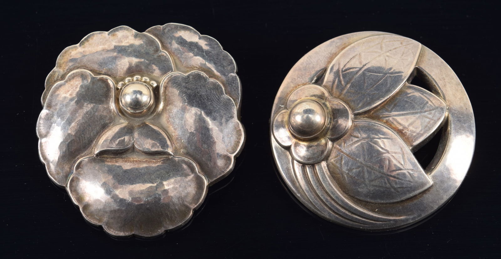 Georg Jensen, Denmark. 2 Sterling silver brooches. Foliate and blossom, #127 and daisy foliate #113. (1 of 5)