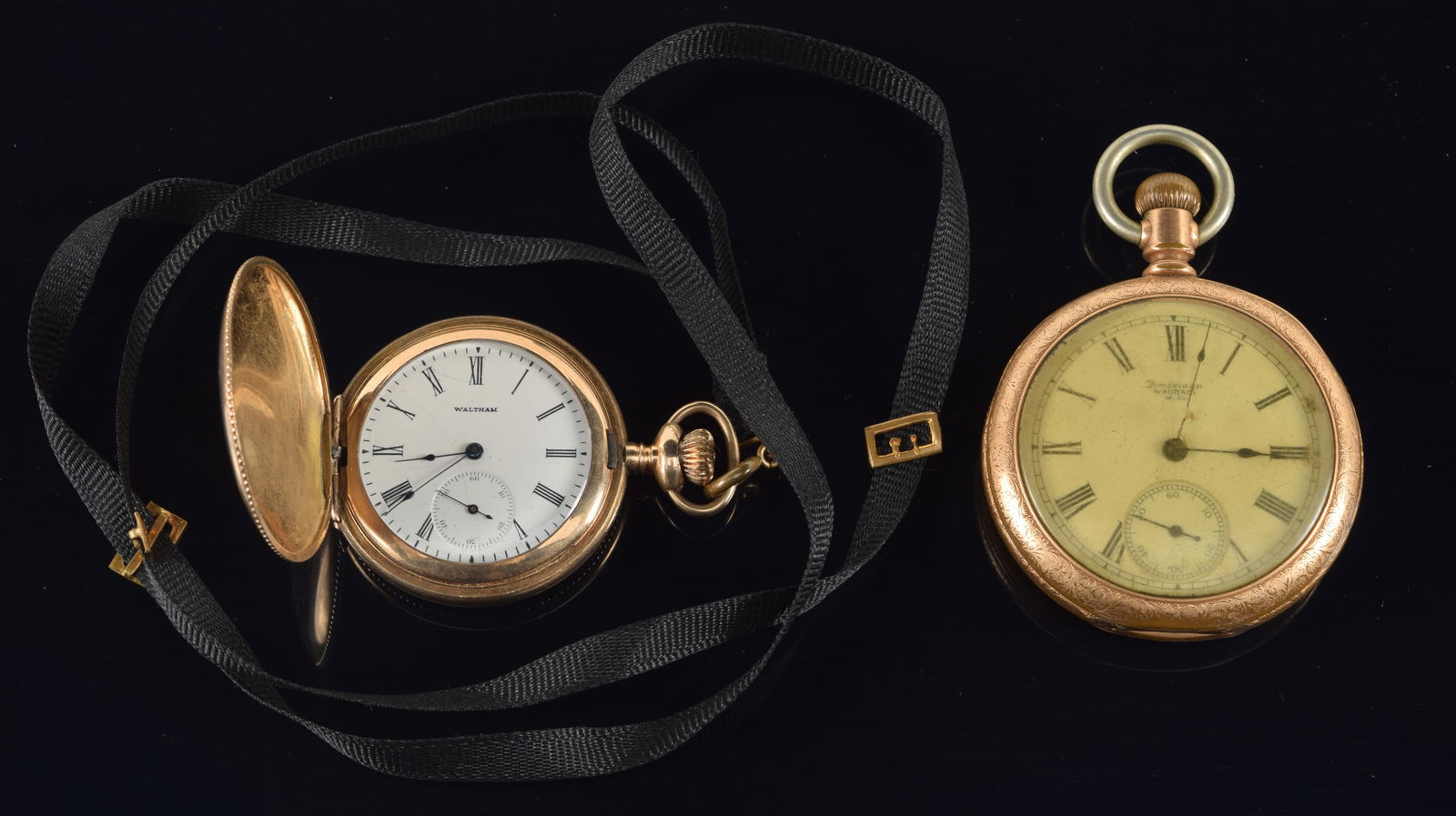 2 antique Waltham gold filled pocket watches, one with fabric neck chain. Largest 52mm diameter. (1 of 3)