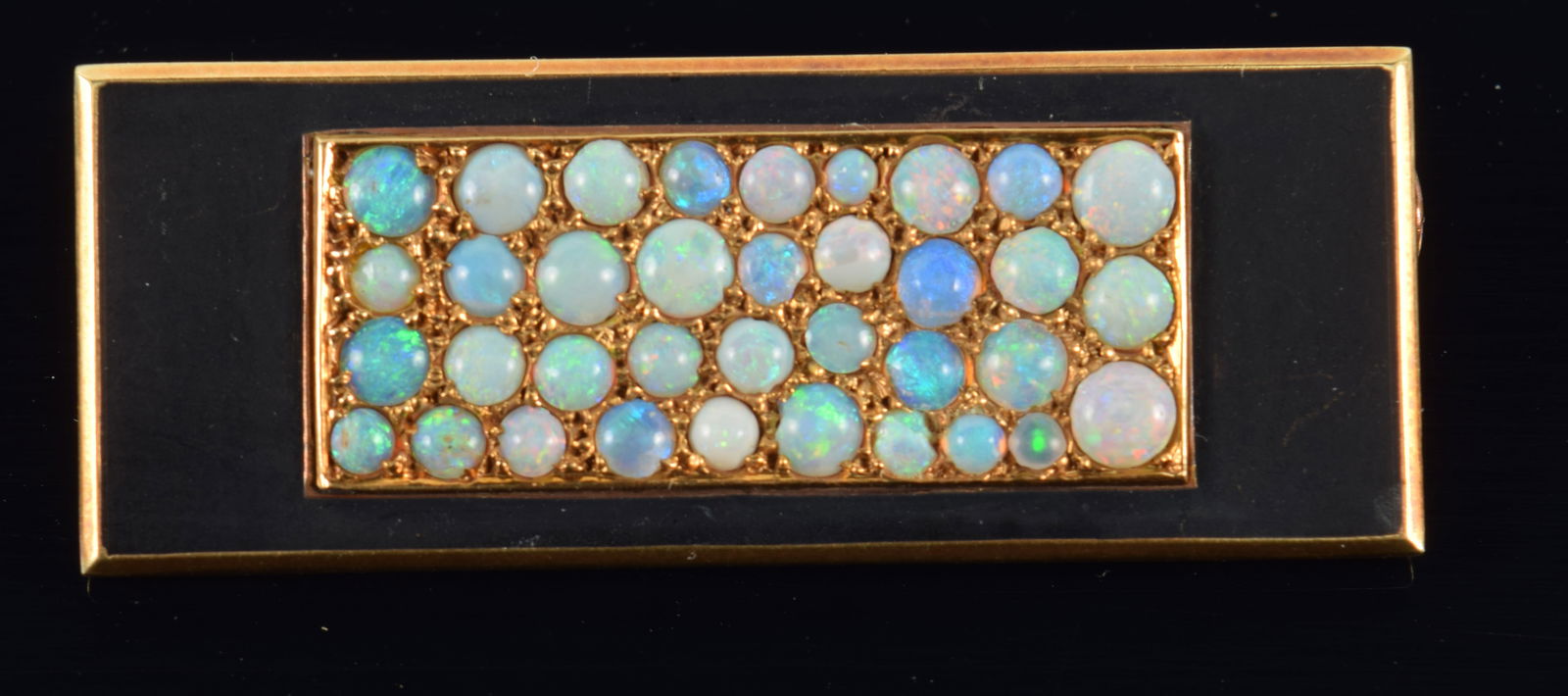14K gold opal mounted designer pin. Pave opal field set against a matte black border and gold frame.: 14K gold opal mounted designer pin. Pave opal field set against a matte black border and gold frame. Tests as 14K. 1.5in long. 6.5 grams.