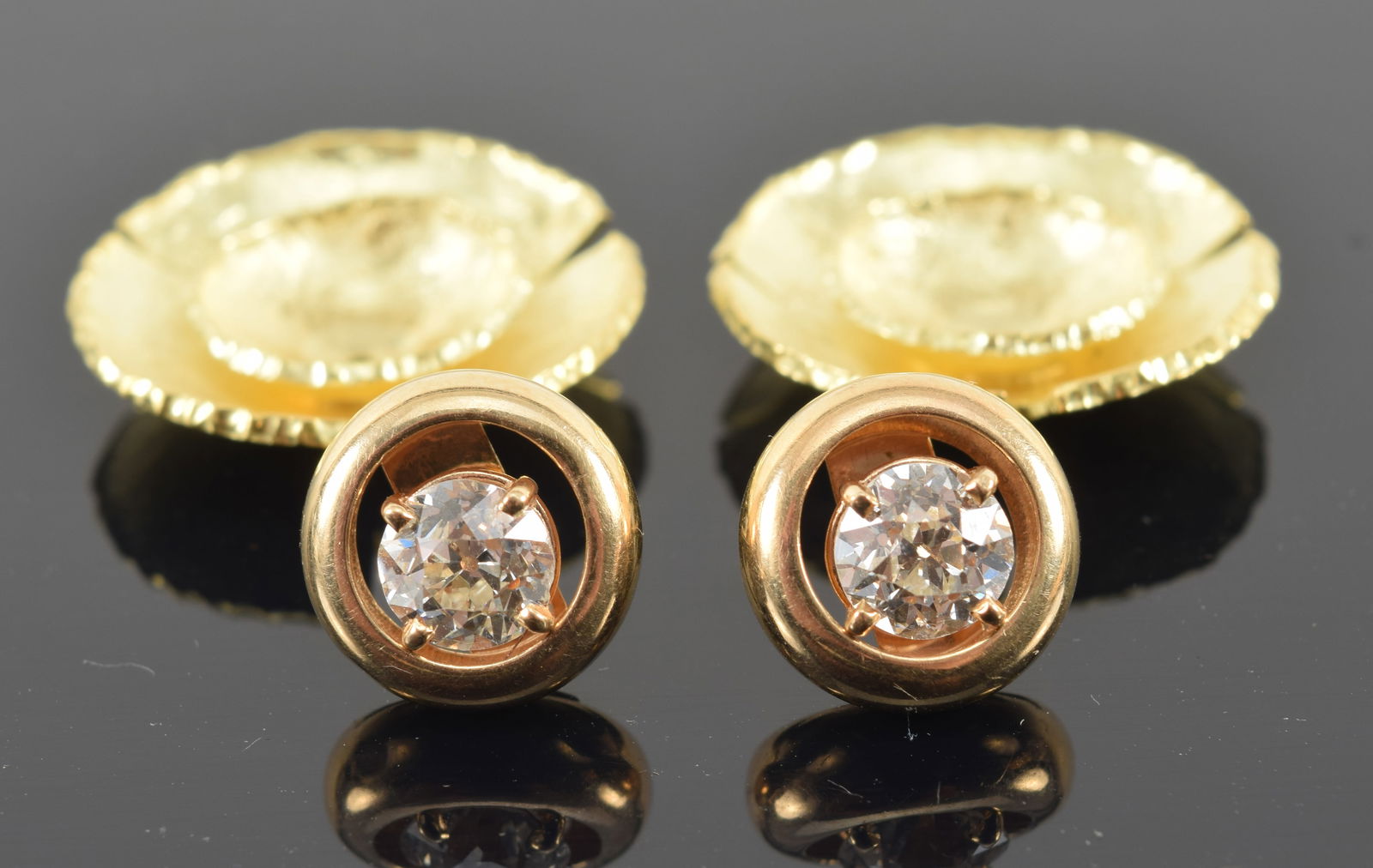 14K gold diamond stud earrings with 2 different backings. Diamonds measures 5.6mm diameter each (1 of 4)