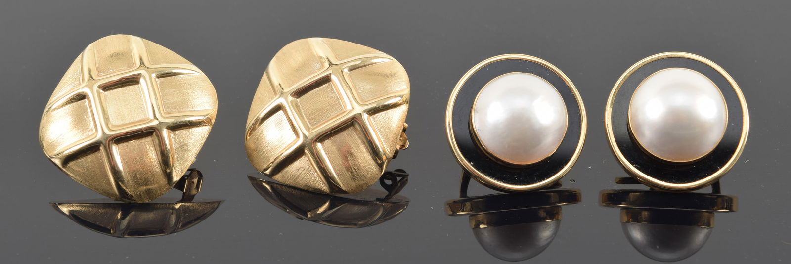2 pairs of 14K gold earrings. 1) Mabe pearl and onyx round form earrings. 0.75in diameter. Marked on (1 of 5)