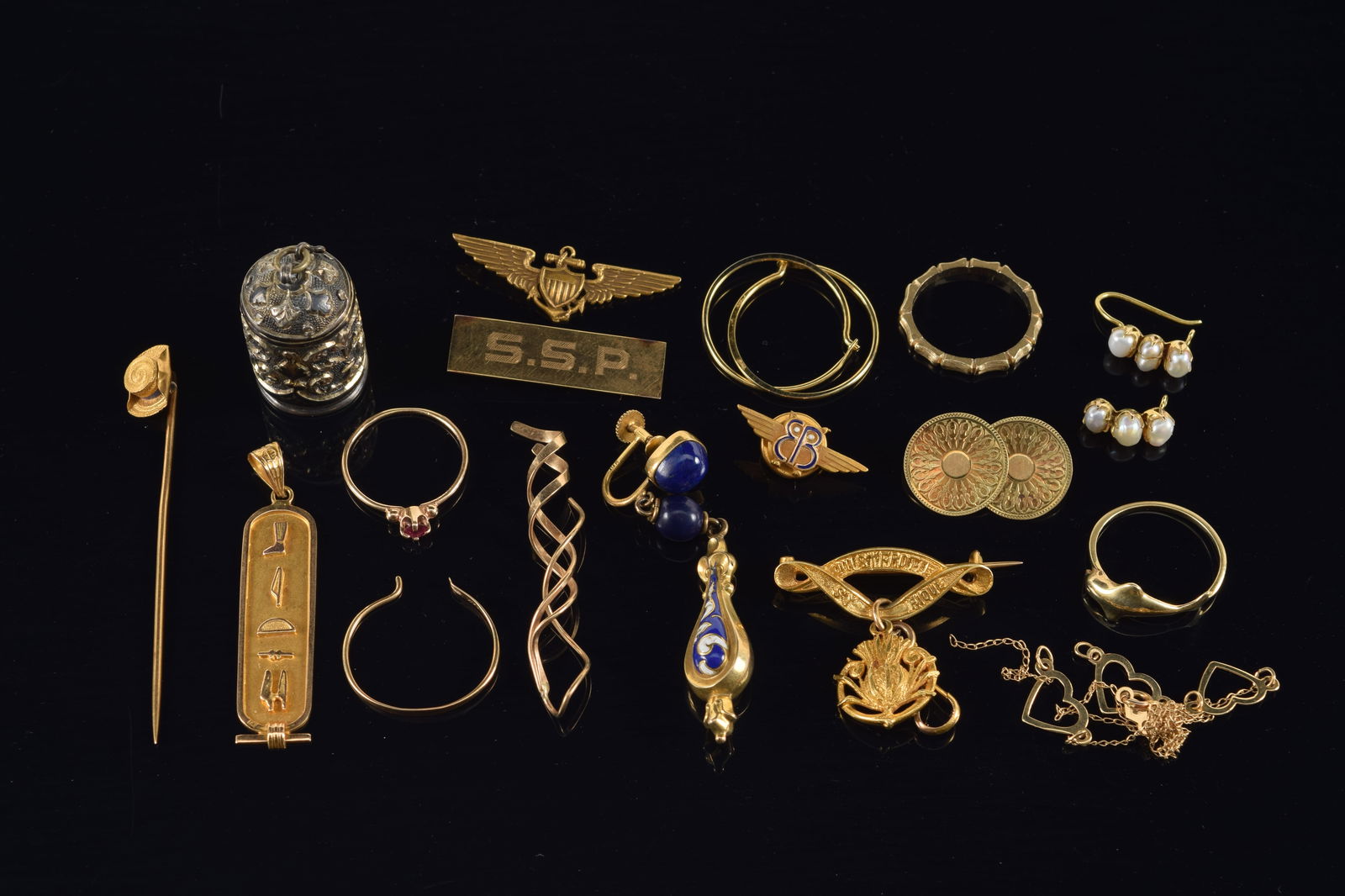 Large lot of assorted gold jewelry items and accessories. To include: Egyptian hieroglyphic pendant, (1 of 5)