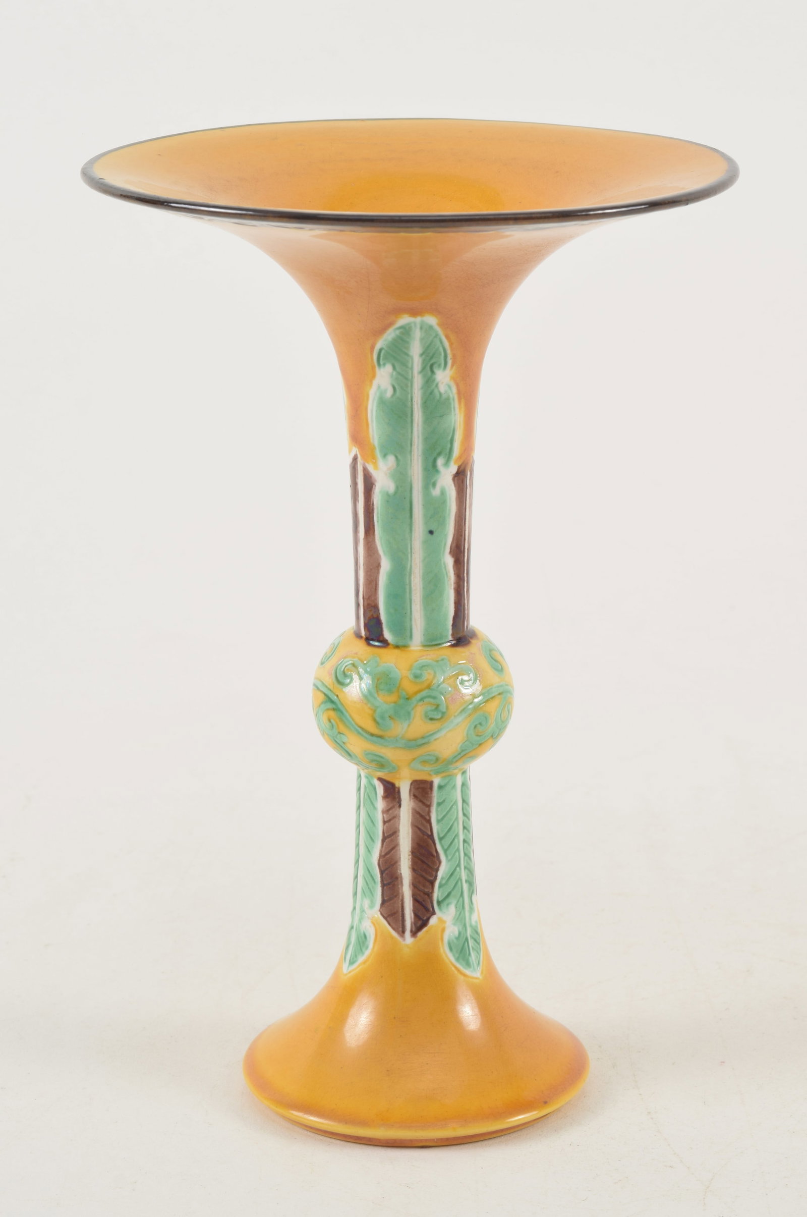 Small 19th century sancai glazed Asian porcelain vase. Flared rim and leaf and scroll decoration.: Small 19th century sancai glazed Asian porcelain vase. Flared rim and leaf and scroll decoration. 6.75in high. Provenance: From a Massachusetts collection.