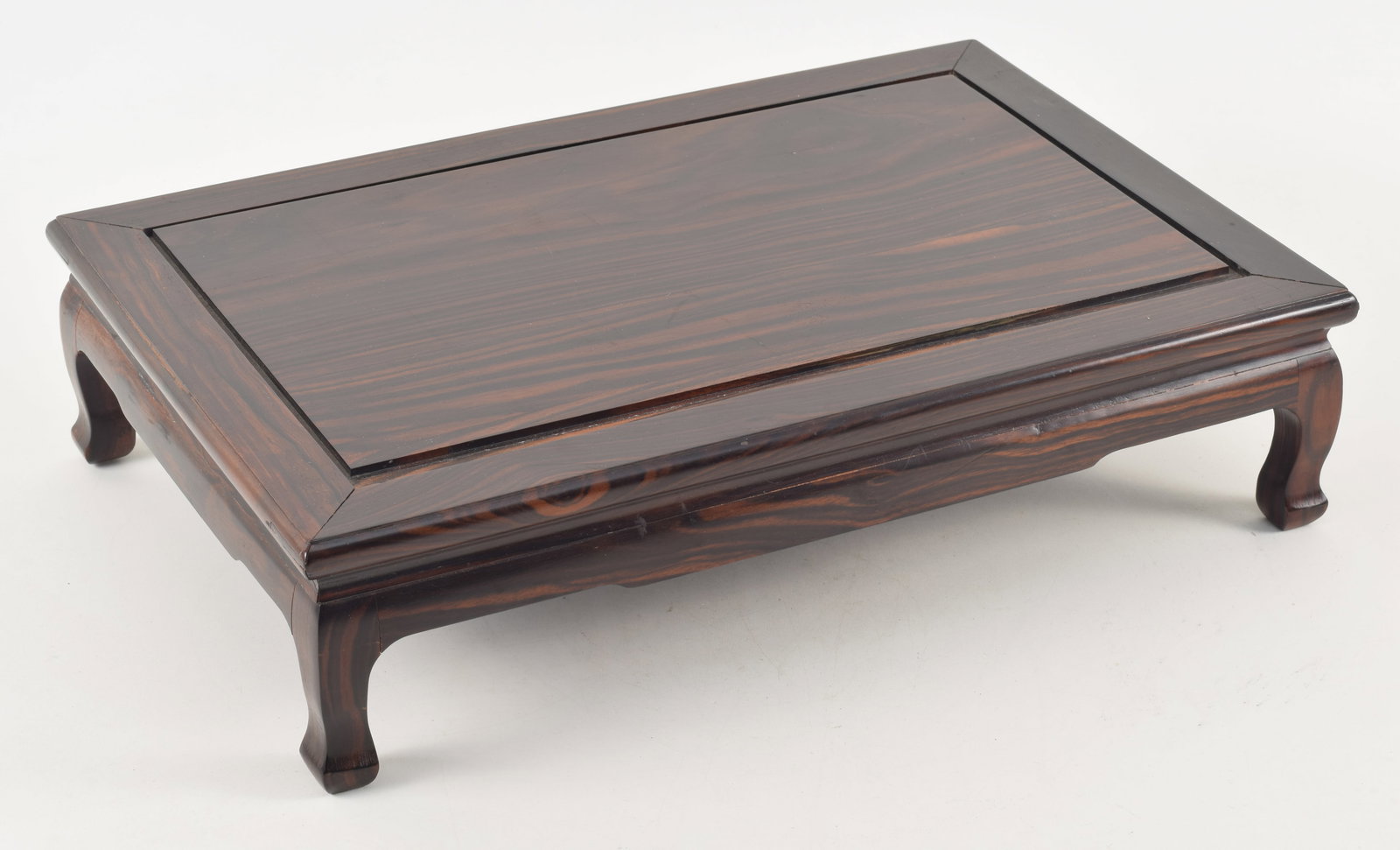 19th century Chinese calamander wood carved stand. 18 x 12 x 4.25in.Top shrunk. Provenance: From a (1 of 8)