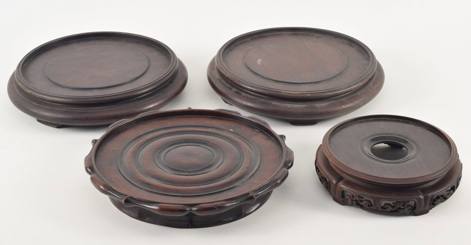 4 19th century Chinese carved wood stands. Large pair 10.5in diameter with 8.5in vase opening rim. (1 of 12)