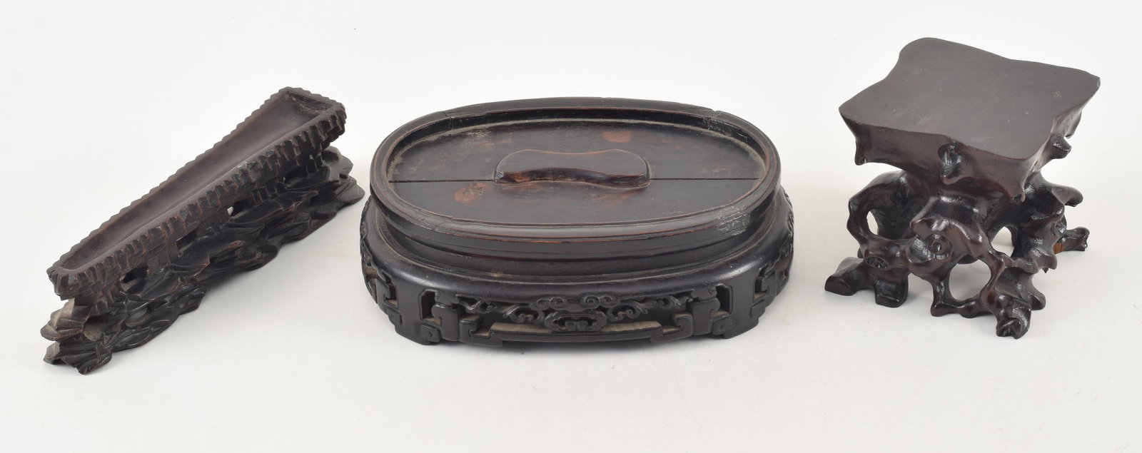 3 19th century Chinese carved wood stands. Largest 8 x 6 x 2.75in. Narrow long stand 8 x 1.75in W. (1 of 10)