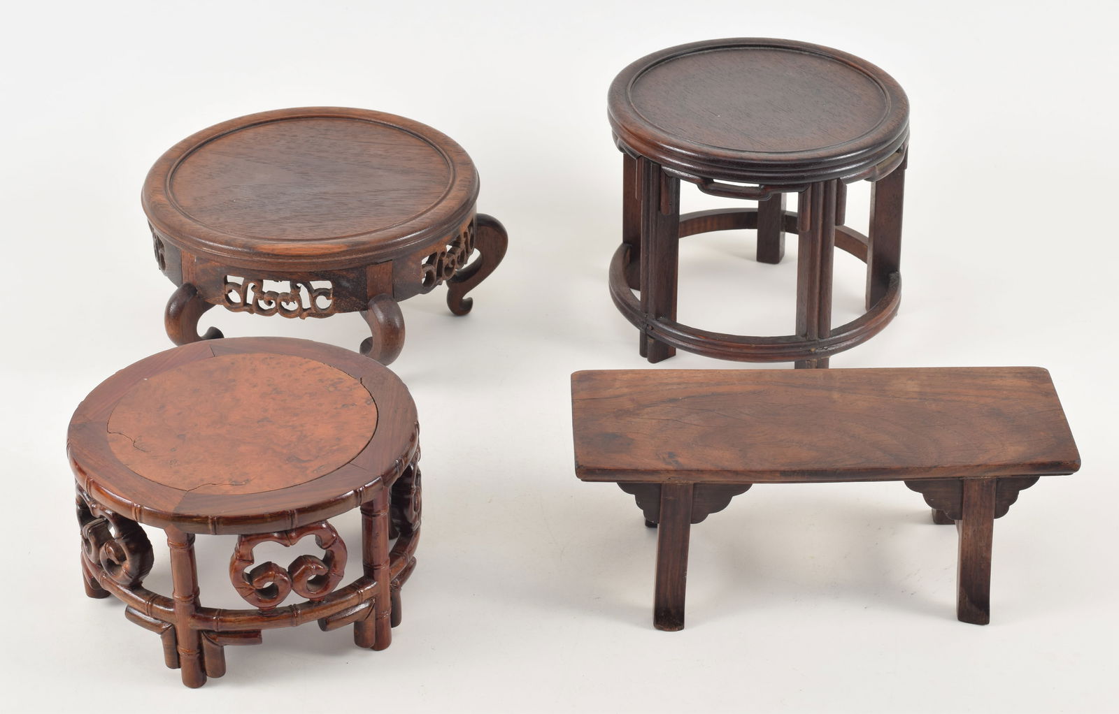 4 19th century Chinese carved stands. Long table form 9.75 x 3.75 x 3.75in. Tallest round stand 6 x (1 of 12)