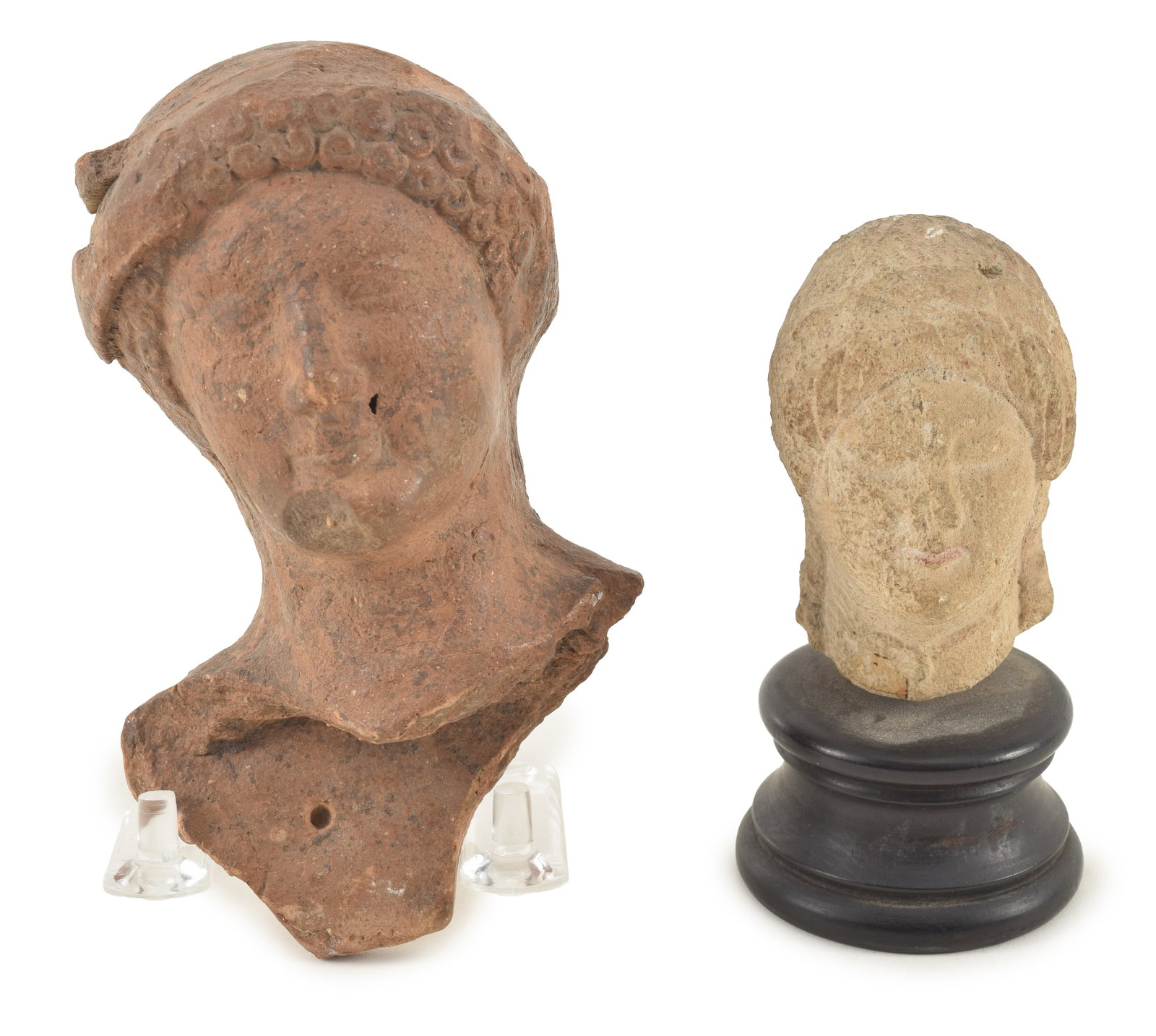 Lot of 2 antiquities. Carved Greek or Roman head fragments. 5in and 2.75in high. Provenance: From a (1 of 10)
