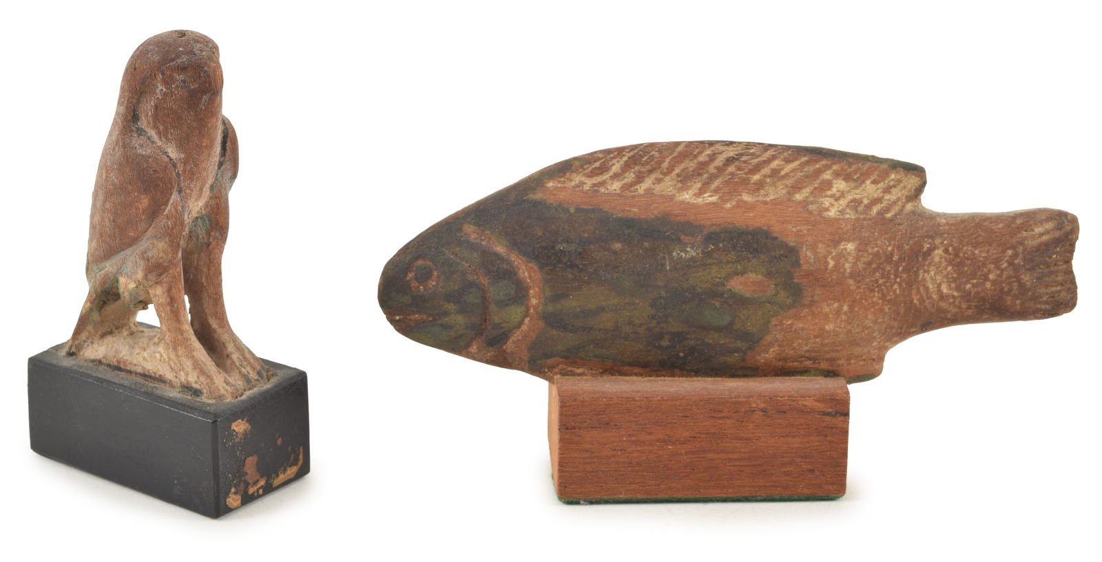 2 Ancient Egyptian antiquities. Carved wooden figures. 1) Carved fish. 5 x 1.75in without stand. 2) (1 of 10)