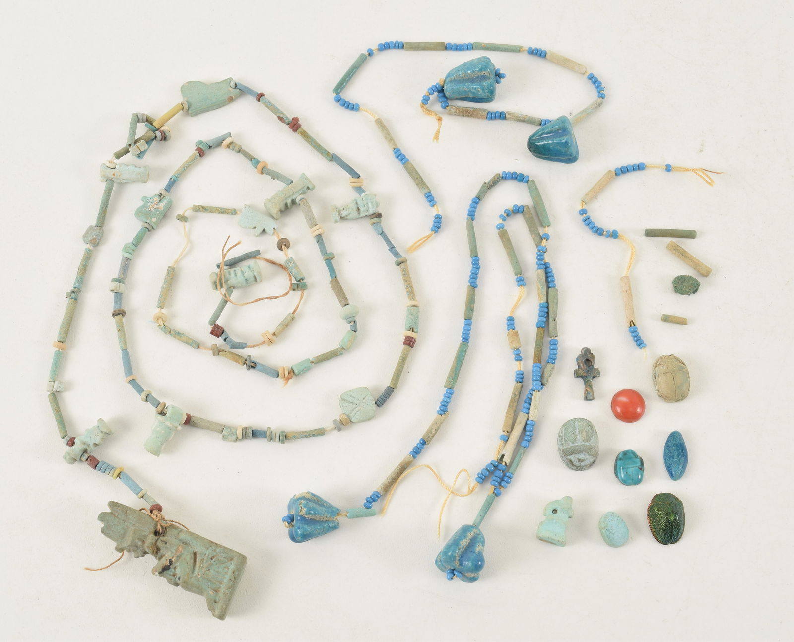 Egyptian turquoise glazed necklace with figural pendant. Parts are loose. Pendant 1.75in high. (1 of 7)