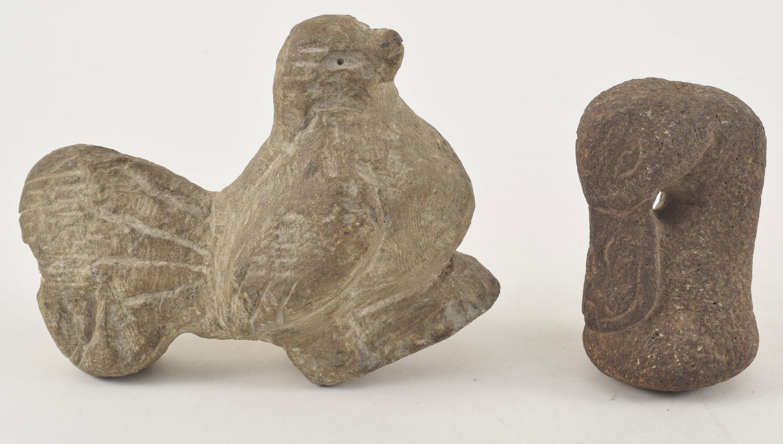 2 stone ethnographic bird carvings. 1) Swan or goose head pounder. 3.75in. 2) A fan tail bird (1 of 7)